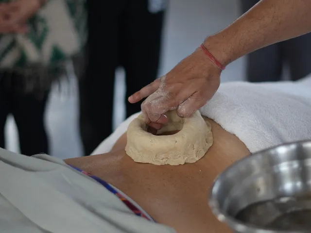 Kati Basti: a dough ring on the lower back being filled with warm medicated oil